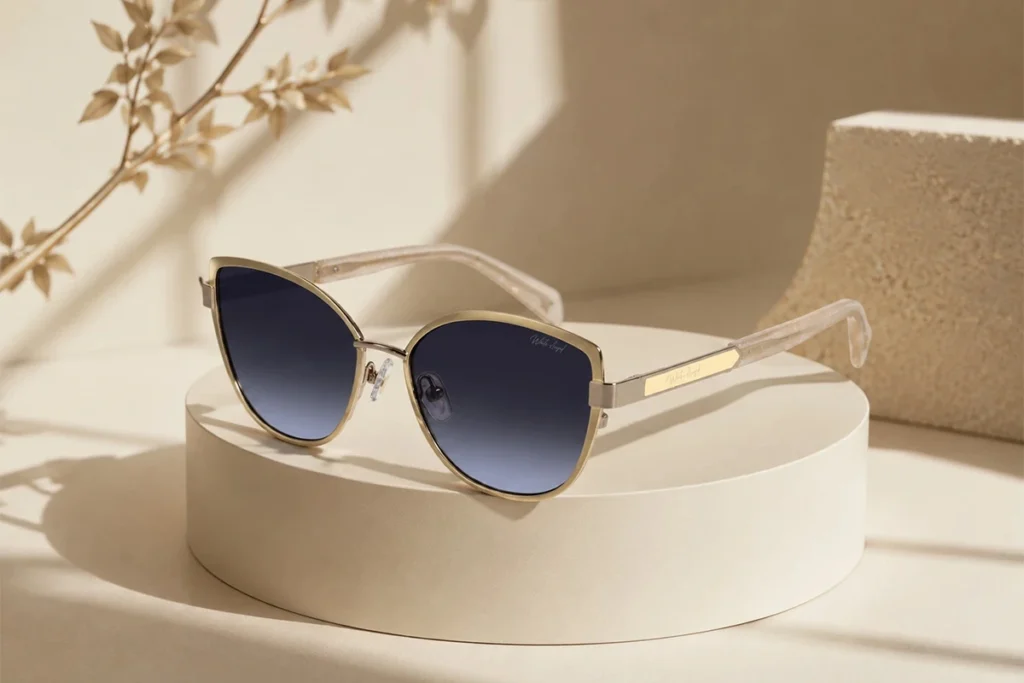 Luxury cat-eye sunglasses on a minimalist display